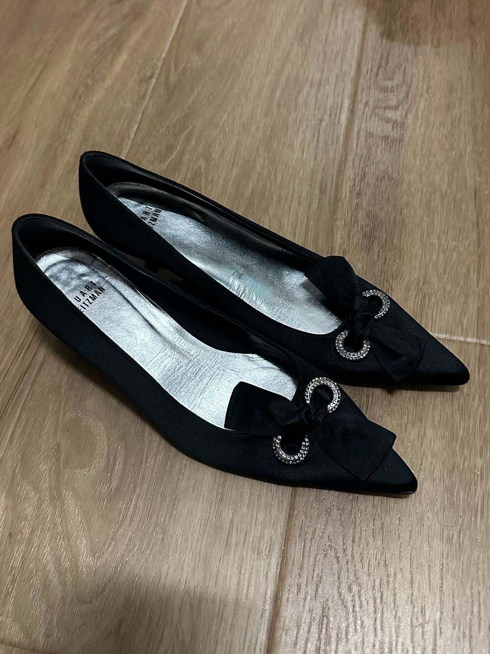 Stuart Weitzman Black Satin Pointed Toe Kitten Heels with Rhinestone Bow Detail